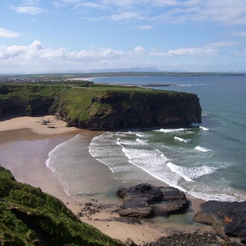 sheltered bay with waves and sand