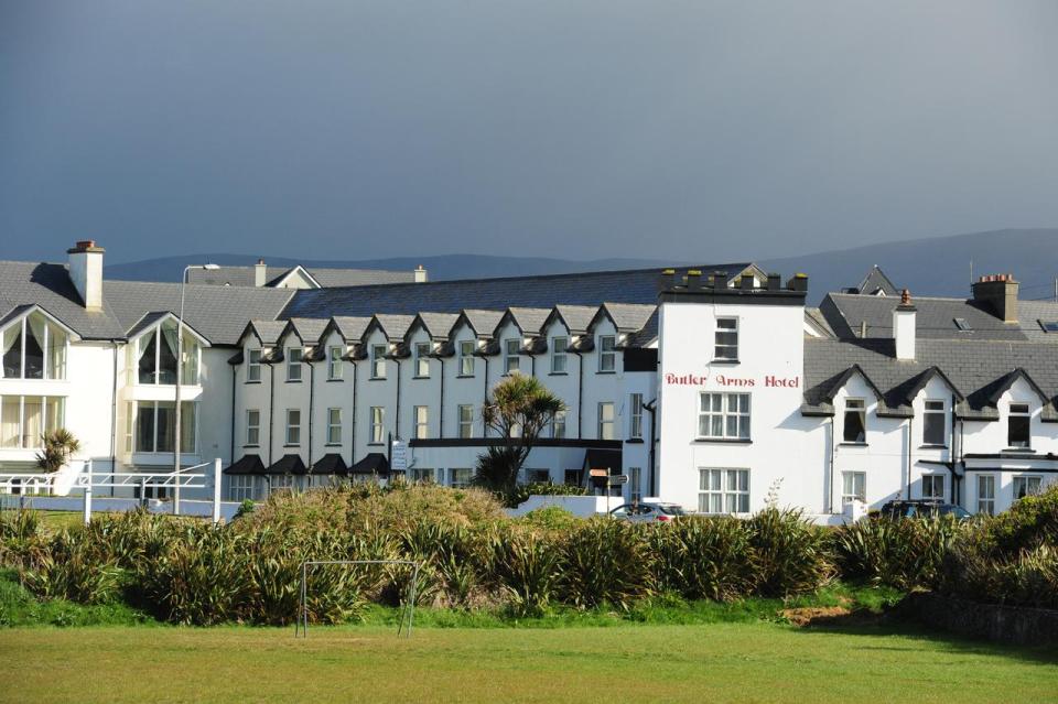 A Hotel Building with grass in the foreground