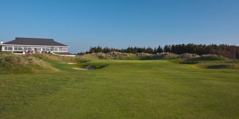 18th hole at donegal golf club with clubhouse in background