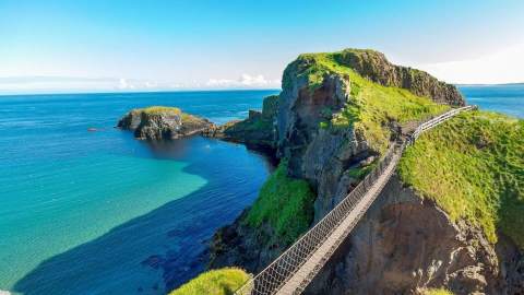 carrick a rede rope bridge on a sunny day with blue sea