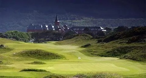 royal county down golf course with house in the background