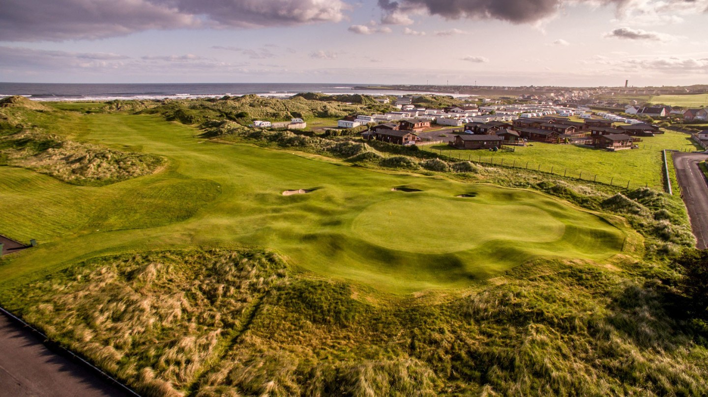 Northwest coast golfing with expansive views in the sunlight