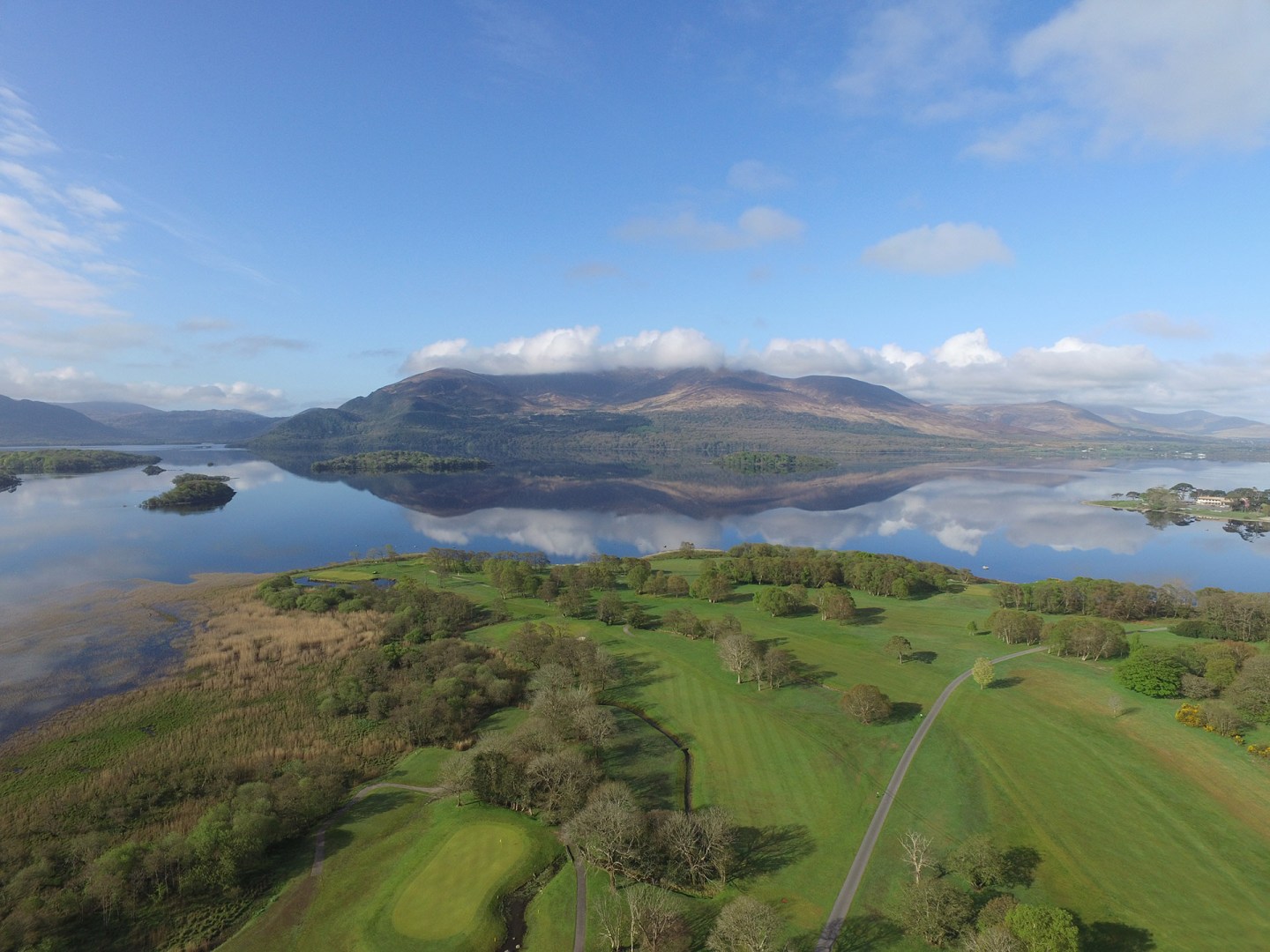 killarney golf course with lake and mountains