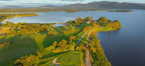 golf course surrounded by coast line