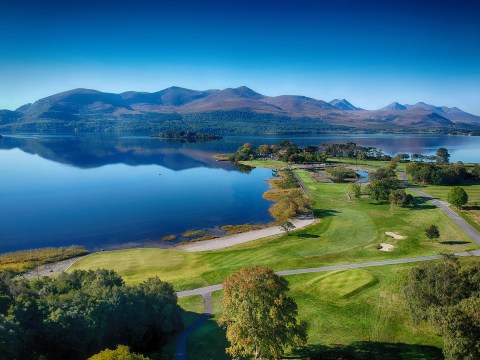 killarney golf course and still lake with mountains
