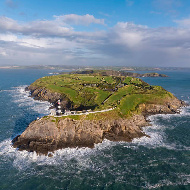 old head of kinsale with lighthouse and waves