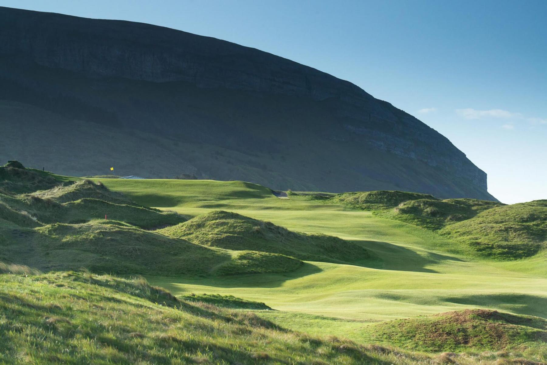 strandhill golf club overlooked by mountain