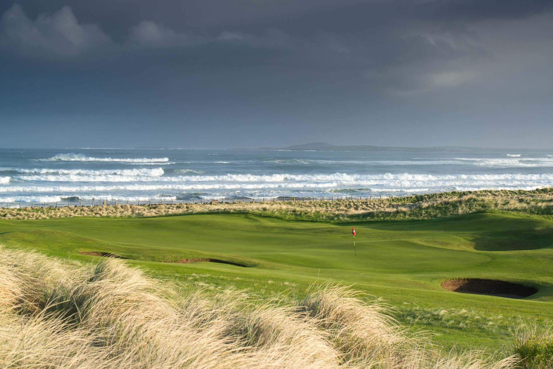 strandhill golf course with large waves coming into the coast