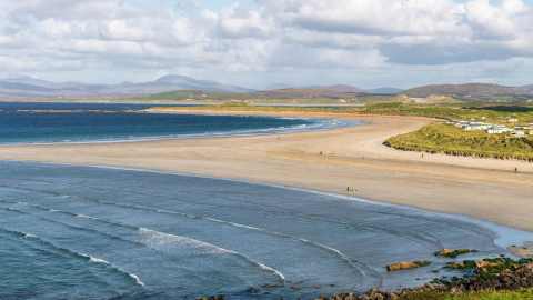 a strand in donegal with gentle waves