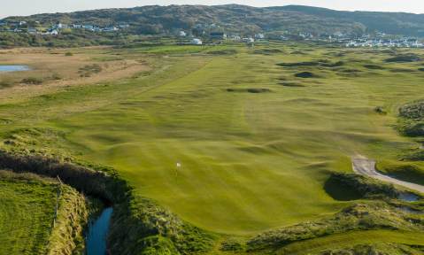 Northwest coast golf course in Ireland under clear skies